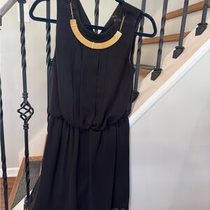 City Triangles Black Sleeveless Mini Dress with Gold Necklace Accent